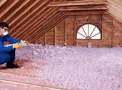 spray foam insulation being installed in the attic