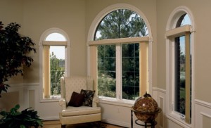 three double hung windows with a circular top