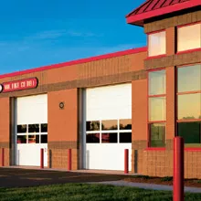 white commercial garage doors at a fire station