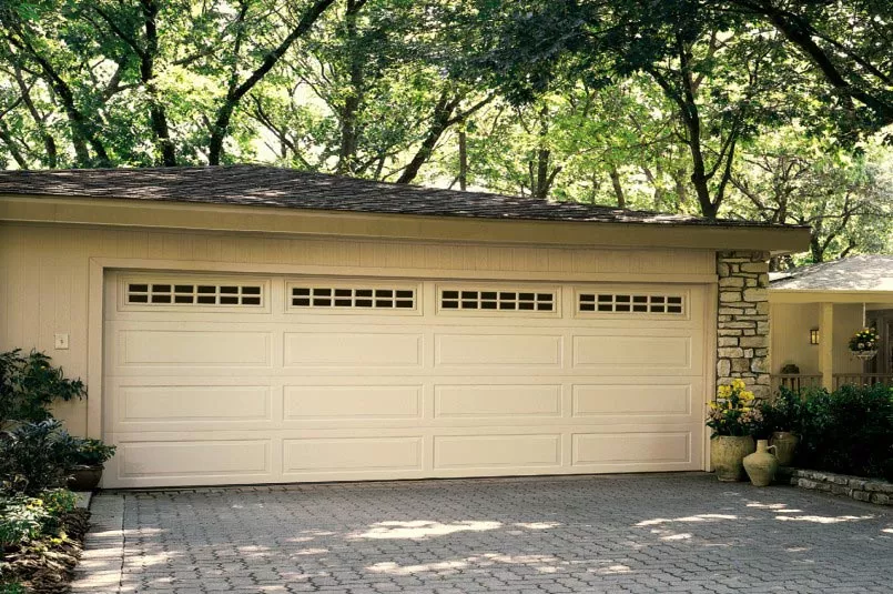 A freshly painted two-car garage on a home